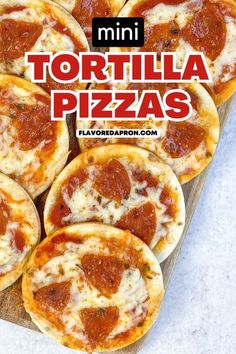 mini tortilla pizzas with cheese and pepperoni are on a cutting board