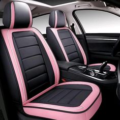 the interior of a car with pink and black seats