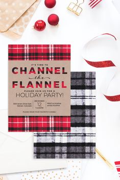 a red and black plaid christmas party card on top of white envelopes next to holiday decorations