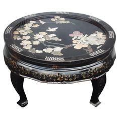 Stunning 1940's Asian Chinoiserie Black Lacquer Floral Form Coffee Table. This table was part of a set bought at auction.