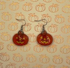 Halloween is one of my favorite times of the year, and what a better way to celebrate this day than with Jack-o-lantern earrings!!  These see-through pumpkin earrings are sure to be a hit this season. Wether you're at a party, trick-or-treating, or watching scary movies at home, these earrings are the perfect accessory is sure to complete all Halloween outfits and costumes.  Perfect for all ages and all Halloween lovers.  Stay creative:) Lantern Earrings, Halloween Parfait, Stay Creative, Trick Or, Jack O'lantern, Halloween Lovers, Pumpkin Earrings, Trick Or Treating, Scary Movies