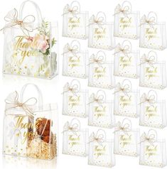 10 clear thank you bags with gold foil lettering and ribbon tied around the top one