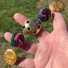 Who’s Ready To Party?!?! This Amazing Piece Can’t Help But Make You Smile And Get Up And Dance! Beautiful Rainbow Seed Bead Earrings Flank A Golden Dome Of Multicolored Rhinestone Starbursts! Finished With Golden Coins And A Gold Toggle Clasp. Measures 8”. All Pieces Are Made With Vintage And Recycled Materials So Flaws Maybe Visible. I Try To Show Any Missing Stones In The Pictures. Please Feel Free To Ask Any Questions. Closures May Be Changed At No Cost. Please Specify What Type Of Closure Yo Bohemian Clip-on Jewelry For Parties, Multicolor Clip-on Party Jewelry, Beach Charm Bracelet, Cat Charm Bracelet, Golden Coins, Golden Dome, Artisan Bracelets, Leaf Bracelet, Repurposed Vintage