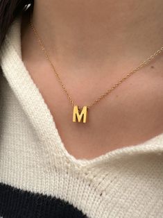 Dainty with an edge, the Initial Necklace makes the perfect gift or addition to your own every day necklace stack. ………………………………….NECKLACE SIZE & MATERIAL❋ 16kt gold plated stainless steel❋ 18" chain❋ nickel free