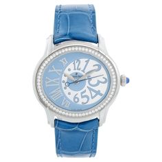 Audemars Piguet "Millenary" Blue Ladies Watch 77301ST.ZZ.D303CR.01 - Automatic self-winding movement. Stainless steel oval case (39 x 35 mm ). Silver and blue dial. Outer diameter with fine engraved texture. Silver painted Roman numerals from 7 to 11. Metallic silver offset center dial with painted blue Arabic Numeral hour markers from 12 - 6 and blue dot hour markers from 7 - 11. Blue Audemars Piguet Leather strap with AP deployant clasp. Pre-owned with Audemars Piguet Box Case 39, Silver Paint, Blue Dot, Roman Numerals, Audemars Piguet, Baby Blue, Womens Watches, Metallic Silver, Wrist Watch