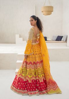 Turn heads at any musical event for the season with this bright ensemble. The choli is beautifully finished with geometric gota work and an accentuated neckline. The canary yellow printed lengha is touched with gota and stone work. The printed organza dupatta completes the piece in harmony Yellow Chanderi Sets For Reception, Designer Yellow Cutdana Sets, Designer Yellow Sets With Cutdana Detailing, Designer Yellow Sets With Cutdana, Yellow Gota Work Sets For Reception, Designer Yellow Sets With Gota Work, Yellow Chanderi Salwar Kameez For Reception, Yellow Anarkali Set With Gota Work For Navratri, Yellow Cutdana Salwar Kameez For Reception