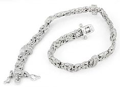 Bella Luce® white diamond simulant 0.46ctw round rhodium over sterling silver Byzantine bracelet. Measures approximately 7.25"L x 0.25"W with hidden box clasp. The diamond equivalent weight is 0.27ctw. Byzantine Bracelet, Diamond Simulant, Box Clasp, White Diamond, Cubic Zirconia, Bracelet, Sterling Silver, Silver, White