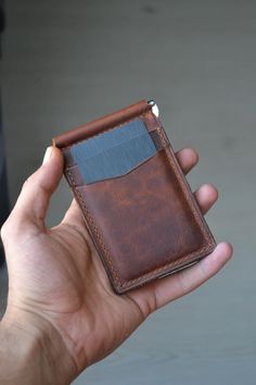 Handmade leather wallet with money clip | Bifold Slim Cardholder for Men | Personalized Wallet Best Gift We present to you a fully handcrafted genuine leather money clip wallet for men 😍. With the durability of handmade craftsmanship and genuine leather, this is the best gift for men. Its slim design and functional clip offer a solution to all your needs without taking up too much space. PERSONALIZATION *You can add up to 8 uppercase letters to the front of the wallet, or order it in the classi Leather Bifold Card Holder With Belt Clip, Brown Bifold Wallet With Key Clip, Brown Bifold Card Holder With Belt Clip, Leather Card Holder With Belt Clip For Gifts, Wallet With Money, Leather Money Clip Wallet, Personalized Leather Wallet, Leather Money Clips, Leather Cardholder