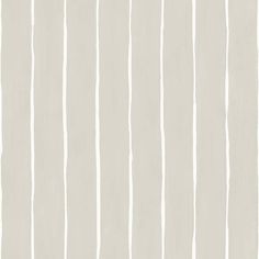 a white striped wallpaper with vertical lines