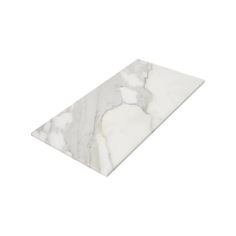 a white marble counter top on a white background, with the edge cut out to look like a triangle