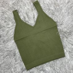 New Basic Top 92 % Nylon 8% Spandex Trendy Khaki Tank Top For Spring, Green Stretch Tank Top For Fall, Trendy Stretch Olive Tops, Basic Green Seamless Tank Top, Versatile Green Seamless Tank Top, Fitted Green Tank Top With Built-in Bra, Compressive Green Seamless Tank Top, Green Cotton Tank Top With Built-in Bra, Floral Chiffon Top