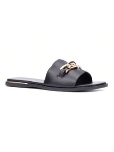 a women's black slider sandal with gold chains on the front and side