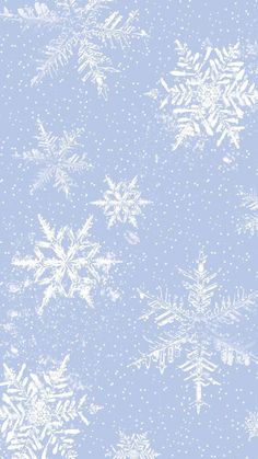 a blue and white background with snow flakes