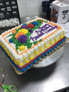 a birthday cake sitting on top of a table