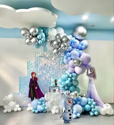 a frozen princess themed birthday party with balloons