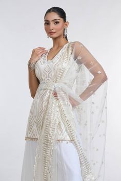 Ivory kurta with sequin and thread embroidery in geometric pattern. Paired with a sharara and dupatta. - Aza Fashions White Cutdana Wedding Dress, White Cutdana Dress For Reception, Elegant White Choli For Festive Occasions, Elegant White Festive Choli, Designer Wear White Choli In Chinon, Designer White Chinon Choli, White Bollywood Choli In Chinon, White Chinon Choli For Designer Wear, White Semi-stitched Sharara For Navratri