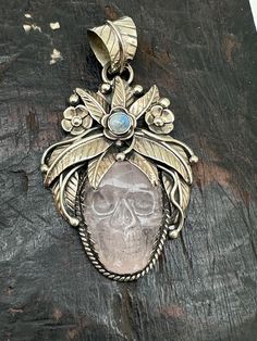 Ross Quartz crystal skull pendant was handcrafted in nepal in Tibetan silver approximately 86mm Tibetan Skull, Unique Skull Shaped Collectible Jewelry, Tibetan Black Quartz, Multicolor Bohemian Skull Jewelry, Collectible Silver Skull Necklace, Semi Precious Jewelry, Skull Carving, Skull Pendant, Crystal Skull