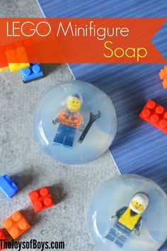 two lego minifigure soaps sitting next to each other on the floor