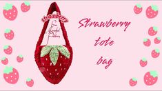 a pink background with strawberries on it and the words strawberry tote bag written in red