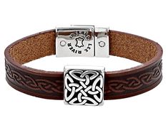 Artisan Collection of Ireland™ Brown Leather Stainless Steel Trinity Knot Bracelet. Magnetic Closure. Measures approximately 7.5"L x 0.73"W. Made by Lee River Leather. Symbolic Adjustable Rectangular Jewelry, Engraved Brown Bracelet Jewelry, Trinity Knot, Knot Bracelet, Magnetic Closure, Brown Leather, Knot, Bracelet, Stainless Steel