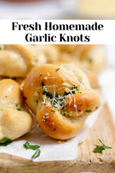 fresh homemade garlic knots on a cutting board