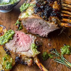 This Herb-Crusted Rack of Lamb is as elegant as it is flavorful, featuring a vibrant blend of fresh herbs, garlic, and lemon zest that perfectly complements the rich flavor of the lamb. Paired with a bright, tangy mint chimichurri, this dish is designed to impress without overwhelming. Perfect for holiday dinners or celebratory meals, each bite combines the earthy, herbaceous crust with the refreshing pop of mint and vinegar in the chimichurri. With a quick sear and oven roast, this rack of lamb is easy to execute while still feeling refined and elevated. The fresh, green flavors of the chimichurri balance the richness of the lamb, creating a harmonious dish that's sure to delight any gathering. Mint Chimichurri, Crusted Rack Of Lamb, Lamb Steaks, Rack Of Lamb, Easy Food Art, The Lamb, Lamb Recipes, Oven Roast, Holiday Dinner