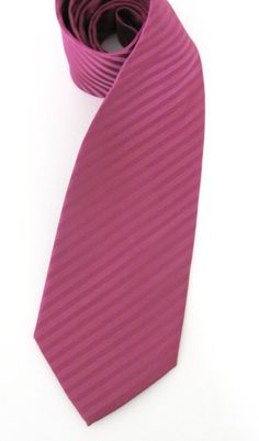 This tie is made of 100% silk, 3.50" wide at it's widest point and 58" long - standard length and width. Hand rolled and sewn by hand. Classic Pink Tie For Black Tie Events, Pink Standard Tie For Black Tie Events, Pink Formal Tie, Classic Pink Suit And Tie Accessories For Groom, Pink Standard Tie Suit Accessories For Groom, Hot Pink Ties For Men, Adjustable Pink Tie For Wedding, Elegant Pink Standard Tie And Accessories, Pink Standard Tie For Groom