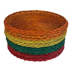 multicolored wicker baskets stacked on top of each other in the shape of a circle