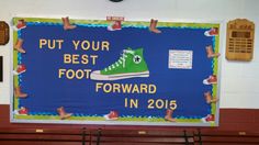 a sign that says put your best foot forward in 2015 on the wall behind a bench