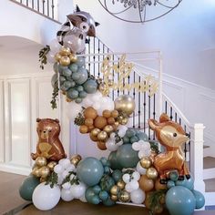 an elaborate staircase decorated with balloons and animals