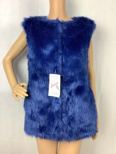 "Tagged: Velvet by Graham & Spencer Faux fur Fur face 70% modacrylic 30% acrylic Fur back 100% polyester lining 5 hook and eye closures Pockets Measurements are approximate and taken laying flat 19\" bust armpit to armpit 20\" along bottom hem 26\" length center back collar to hem Original tags and sterlustre treatment ticket Never worn" Faux Fur Vest, Faux Fur Vests, Fur Vest, Rocker, What To Wear, Royal Blue, Fur Coat, Faux Fur, Jackets & Coats