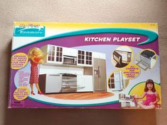 the box is open to show what's in the kitchen playset and how it looks like