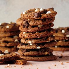 a stack of chocolate cookies with marshmallows on top