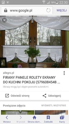 an image of a window with white curtains on it and the caption's page below