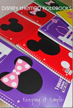 several disney themed notebooks are shown on a table with the words, keep it simple