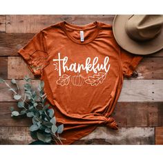 THANKFUL T-SHIRT with a Cross REGULAR OR GLITTER VINYL Christian Thanksgiving Shirt, Short Sleeve T-shirt With Screen Print For Fall, Orange Letter Print T-shirt For Fall, Orange T-shirt With Letter Print For Fall, Fall Short Sleeve T-shirt With Text Print, Orange Screen Print T-shirt For Fall, Casual Thanksgiving T-shirt With Letter Print, Casual Thanksgiving T-shirt With Graphic Print, Thanksgiving Graphic Print Crew Neck T-shirt