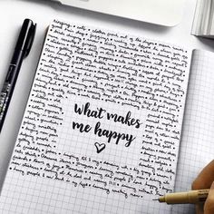 someone is writing what makes me happy on a notebook