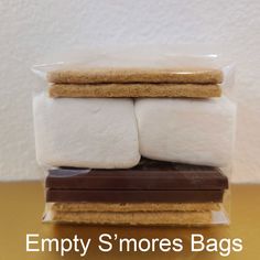 Clear empty bags for DIY s'mores favors. Great for a wedding, baby shower, graduation, or anything else. Fits fillings for up to 2 smores: 2 graham cracker sheets (broke in half), 1 chocolate bar (broke in half), 2 jet puffed marshmallows.  Bags are food safe material compliant 3" wide x 2" deep x 6 1/2" tall. Flat bottom, gusseted, with a paper insert. Seal the back of the bag with tape or tie it up with ribbon.  No returns accepted as this is a food contact item. No food included. More supplie Smore Party Favor, S’more Favors For Wedding, S’more Love Party Favors, S’mores Party Favor, S’mores Favor Bags, Smores Favors, Smores Pops, Jet Puffed Marshmallows