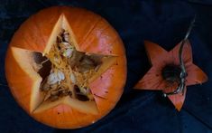 an orange pumpkin has been cut in half to look like a star