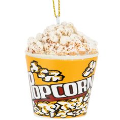 popcorn bucket ornament with chain hanging from it's side on an isolated white background