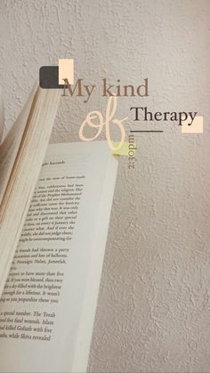 an open book with the words, my kind of therapy on it's cover