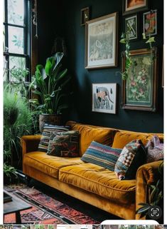 a living room filled with furniture and plants