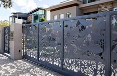 a gate that has been designed to look like it's made out of metal