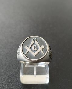 Masonic Ring For Mens Handmade Freemasonry SILVER 925 METAL-silver 925 Each ring is sealed on the purity of the metal to 925 All creations are specially designed, hand cast of solid silver, and individually polished Black oxidised background to enhance masonic symbols Made entirely in GREECE Chi Rho, Masonic Symbols, Masonic Ring, Signet Rings, Handcrafted Rings, Lovely Ring, Silver Rings Handmade, Hand Cast, Design Silver