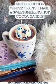 a cup of hot chocolate with marshmallows on top and the words middle school winter crafts make a sweet - smelling hot cocoa candle