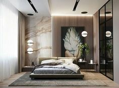 a modern bedroom with marble walls and artwork on the wall, along with a large bed