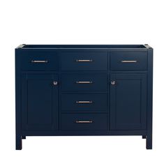 a blue cabinet with brass handles and drawers