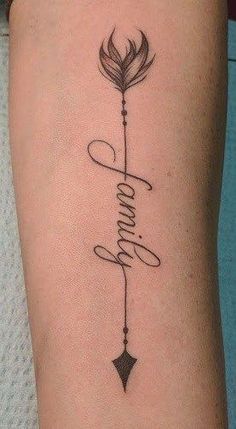 a tattoo on the arm that says hope and an arrow with a feather hanging from it