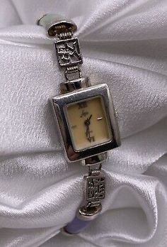 Vintage Aria Ladies Color Gemstones & Dainty Watch MOP Dial Sterling Silver 925  | eBay Adjustable Silver Analog Jewelry And Watches, Adjustable Silver Jewelry And Watches With Round Dial, Silver Rectangular Jewelry And Watches For Anniversary, Silver Analog Jewelry With Rectangular Dial, Silver Watches With Engraved Rectangular Dial, Silver Analog Watch With Rectangular Dial, Adjustable Jewelry With Rectangular Dial For Gifts, Rectangular Silver Watch As A Gift, Silver Analog Jewelry And Watches As Gift