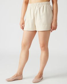 Crafted for comfort and style, the FAUX THE RECORD short features a wide elastic waistband that is both chic and versatile. The faux leather material adds a touch of ruggedness, while the pull-on design allows for easy wear. Faux leather shorts Two functional side pockets Inseam: 2" Length: 14" 100% polyurethane Care i Faux Leather Shorts, Leather Short, Elastic Waist Shorts, Spring Looks, Spring Tops, Leather Shorts, Sweaters Knitwear, Tank Top Cami, Easy Wear